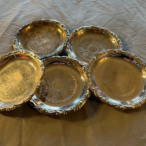 Set of five silver plated 4 inch plates